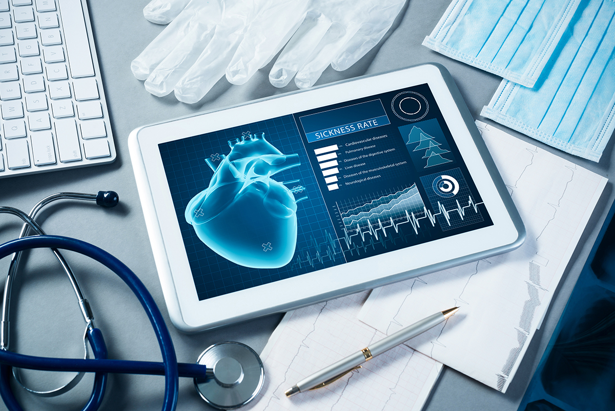 White,Tablet,Pc,And,Doctor,Tools,On,Gray,Surface
